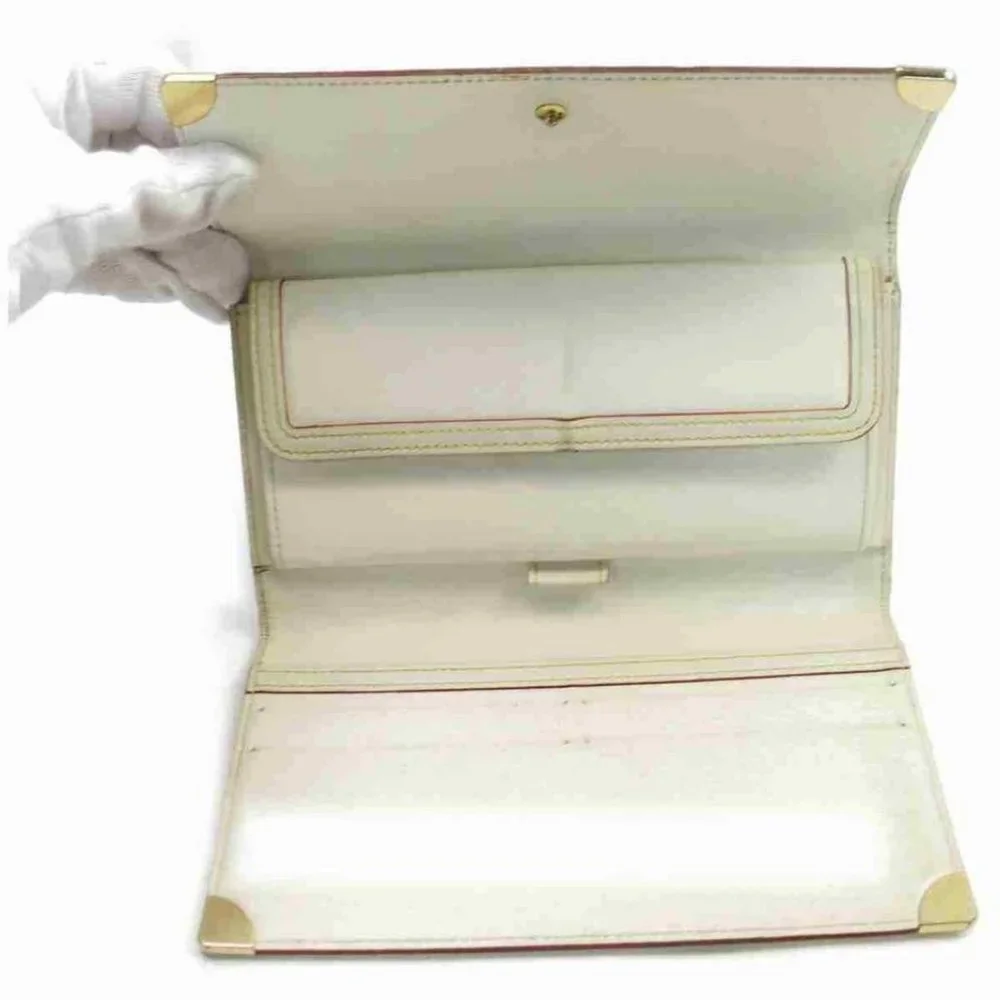 Louis Vuitton Suahli Leather Portefeuille Tresor